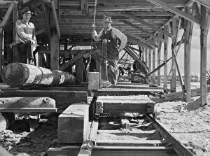 The sawmill carriage and log turner... Ola self-help sawmill co-op, Gem County, Idaho, 1939. Creator: Dorothea Lange