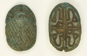Scaraboid: Face Motif on Top, Floral Designs on Base, Egypt, Second Intermediate Period Scaraboid: Face Motif on Top, Floral Designs on Base, Egypt, Second Intermediate Period