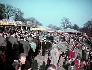Fair Prints: Scene at a busy funfair, c1955-1965. Creator: Arthur Charles Kirby Ware