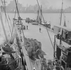 East River Prints: A scene at the Fulton fish market showing the dock where New England fishing