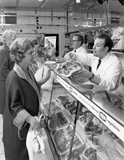 Shopkeeper Gallery: Scene inside a butchers shop, Doncaster, South Yorkshire, 1965. Artist: Michael Walters