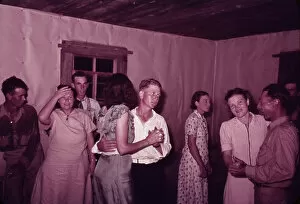 Okie Gallery: Scene at square dance in rural home in McIntosh County, Oklahoma, 1939 or 1940. Creator: Russell Lee