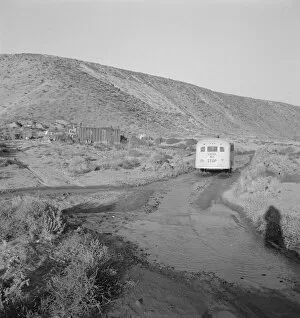 Flooding Gallery: School bus starts up the flat 7: 30 a.m. to collect children of new... Malheur County, Oregon, 1939