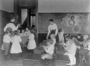Science classroom scene - 7 or 8 year-olds studying the magnet, 8th Division, Washington DC, (1899?) Creator: Frances Benjamin Johnston