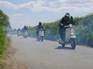Scooters enjoying run on country lane