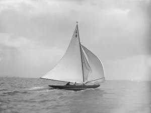 Running Downwind Prints: Scotia IV running downwind with spinnaker, 1913. Creator: Kirk & Sons of Cowes