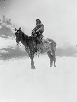 Scout Prints: The scout in winter-Apsaroke, c1908. Creator: Edward Sheriff Curtis