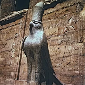 Egyptian Art Gallery: Sculpture of the god Horus at the Edfu temple entrance in Egypt