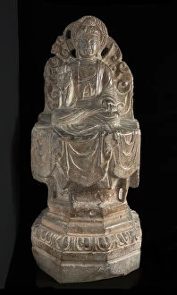 Seated Buddhist figure: high octagonal pedestal and perforated