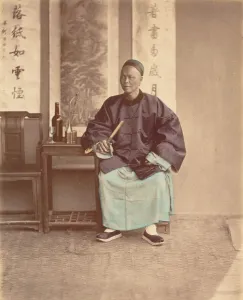 Raimund Von Prints: [Seated Chinese Woman with Fan], 1870s. Creator: Baron Raimund von Stillfried