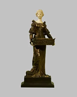 Images Dated 25th March 2015: Seated female figure in bronze and ivory