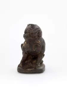 Gilt Bronze Prints: Seated lion, Tang dynasty. Creator: Unknown