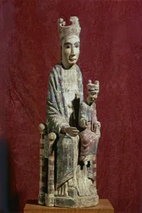 Knee Prints: Seated Virgin and Child on the left knee, carving in polychromed wood