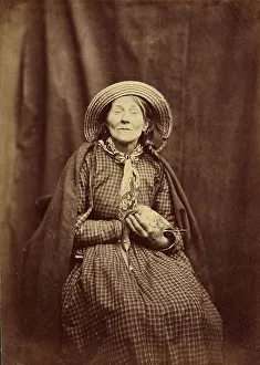 Straw Hat Prints: Seated Woman with a Bird, about 1855. Creator: Hugh Welch Diamond