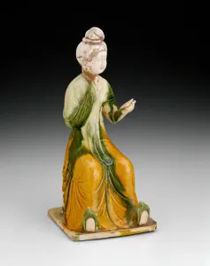 Seated Woman Holding Mirror, Tang dynasty (A. D. 618-907), first half of 8th century