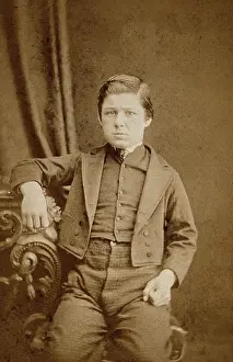 Uncertain Prints: A seated young man with clenched fists