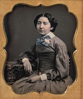 Seated Young Woman Wearing Collar with Large Bow, Resting Arm on Table, 1850s Seated Young Woman Wearing Collar with Large Bow, Resting Arm on Table, 1850s