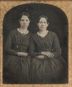 Two Seated Young Women Identically Dressed, 1840s. Creator: Unknown