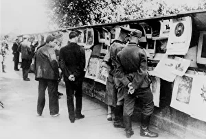 Occupied Prints: Second-hand book and print stalls on the bank of the Seine, German-occupied Paris, 1940
