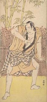 Hanataka Koshiro Prints: The Second Ichikawa Komazo as a Man standing in a Dramatic Attitude, ca. 1790. ca. 1790