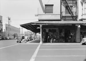 Secondhand store, street corner of San Joaquin Valley town on U. S. 99, Fresno, CA, 1939. Creator: Dorothea Lange