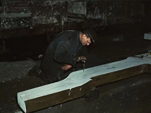 Description Gallery: Section of a locomotive frame, which will be welded to replace a broken...train, Chicago, 1942