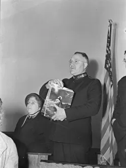 Selling Easter edition of the War Cry, Salvation army, San Francisco, California, 1939. Creator: Dorothea Lange