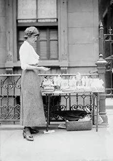 Selling medals etc. before St. Anne's, between c1910 and c1915. Creator: Bain News Service