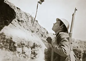 Sentry Prints: A sentry in the trenches looking through an improvised persicope