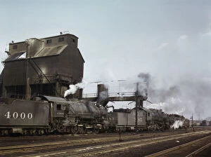 Engine Gallery: Servicing engines at coal and sand chutes at Argentine yard, Santa Fe R.R. Kansas City, 1943