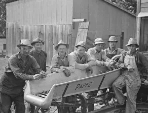 Ensilage Cutter Prints: Seven of the eight farmers shown with their