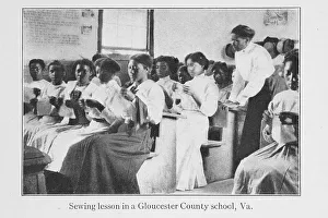 Practical Prints: Sewing lesson in a Gloucester County school, Va. 1915. Creator: Unknown