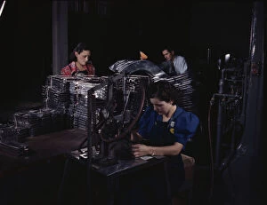 Employee Gallery: Sheet metal parts are numbered with this pneu...North American Aviation, Inc. Inglewood, CA, 1942