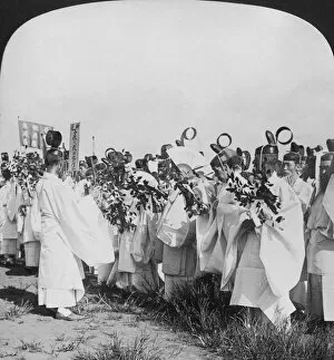 Shinto priests in a funeral procession for Hitachi Maru victims, Tokyo, Japan, 1905. Artist: HC White