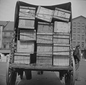 Shipping fish by horse-drawn vehicle from Fulton fish market, New York, 1943. Creator: Gordon Parks