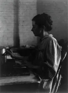 Shoemaking Prints: Shoe factories, Lynn, Mass.: woman seated at table