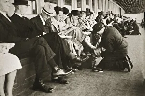Polishing Prints: Shoe shiners working on board the Staten Island Ferry, New York, USA, c1920s-c1930s