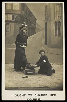 Cross Dressing Prints: A shoeshine boy cleans the boots of a man in drag, c1905. Creator: Unknown