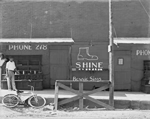 Bicycle Collection: Shoeshine stand, Southeastern U.S. 1936. Creator: Walker Evans