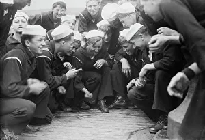 Shooting craps on NEW YORK, between c1910 and c1915. Creator: Bain News Service