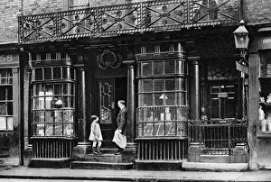 A shop front, Artillery Lane, off Bishopsgate, London, 1926-1927. Artist: McLeish