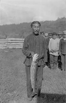 Gi Ivanov Prints: Shoria Man with Fish, Caught in the River Mrassu Rapid, 1913. Creator: GI Ivanov