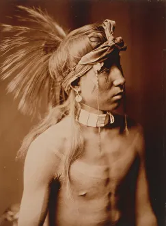 Apache Prints: Shows As He Goes, half-length portrait, c1905. Creator: Edward Sheriff Curtis
