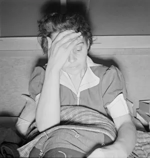 Illness Gallery: Sick woman awaits visit of the doctor, FSA camp, Merill, Klamath County, Oregon, 1939