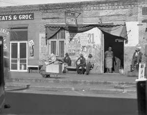 Cardboard Box Prints: Sidewalk scene in Selma, Alabama, 1935. Creator: Walker Evans