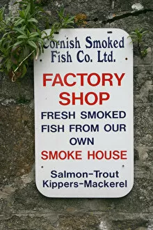 Cornish Gallery: Sign advertising smoked fish, Charlestown, Cornwall