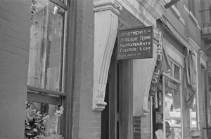 A sign offering apartments for rent, 61st Street between 1st and 3rd Avenues, New York, 1938. Creator: Walker Evans