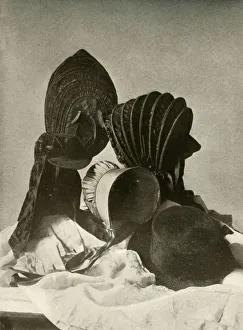 Gloves Prints: Two silk calashes; riding-cap; Quaker bonnet; hat; gloves; and skirt