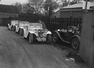 Motor Racing Team Prints: Three Singer cars and a MG PA at a motoring trial, 1930s. Artist: Bill Brunell
