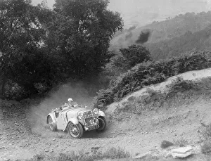Cornering Prints: A Singer Nine taking part in the Barnstaple Trial, Barnstaple, Devon, 1935